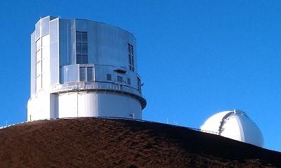 The Subaru Telescope observatory housing an 8.2 M optical scope. The Keck 1 dome is visible to the right of the Subaru observatory. Image by ACA member Tom Alexander.