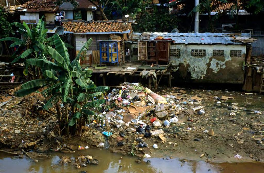 GCSE GEOGRAPHY B Sample Assessment Materials 11 Study Photograph 1.5 and Table 1.6 below. They provide more information about the informal settlement of Jembatan Besi. Photograph 1.5 Typical housing in Jembatan Besi Table 1.