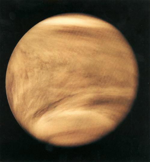 Venus The atmosphere of Venus is very dense and an opaque layer of clouds covers the planet, such that we cannot see the surface directly and it can only be mapped by radar.