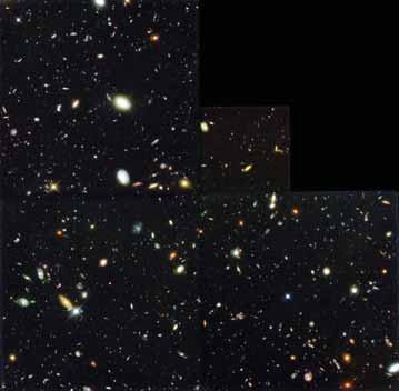 XXIV ENGLISH SUMMARY Figure VI: The Hubble Deep Field North. A very deep image of a patch of sky near the Big Dipper constellation. All the objects in this image are distant galaxies.