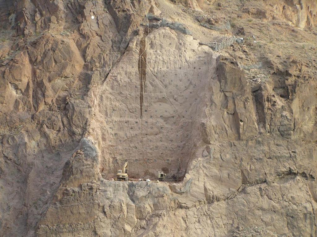 Bedrock Volcanic Tuff Slopes/Foundations Goal: Produce a stable cut slope for Arizona Skewback on Hoover Dam Bypass In-situ testing: downhole seismic, goodman jack, RQD & optical televiewer Lab: