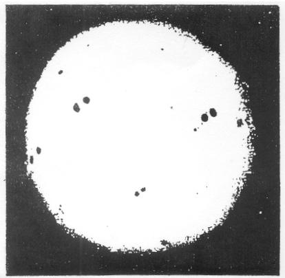 SUNSPOT ACTIVITY- The photographs below show sunspots as they appeared on three different dates. Like the poles of a magnet, sunspots seem to occur in pairs.