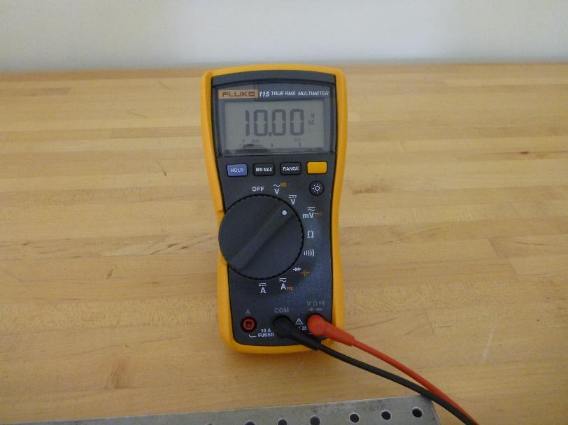 Appendix B Using a digital multimeter A digital multimeter (DMM) is a device that measures a variety of electrical properties.
