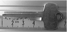 APPENDIX E: ACCURACY, PRECISION AND UNCERTAINTY Figure E-1 If the true value was not as important as the magnitude of the value, you could say that the key s length was 6cm, give or take 1cm.