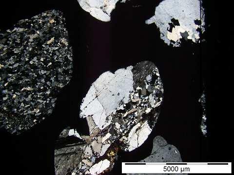Reactive coarse aggregate (siliceous) This aggregate was classified as reactive by petrographic analysis, because it