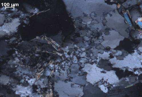 Images of granite B sample, a) quartz with undulating extinction; b) quartz with intense subgranulation, both image obtained in Xs nicols mode.
