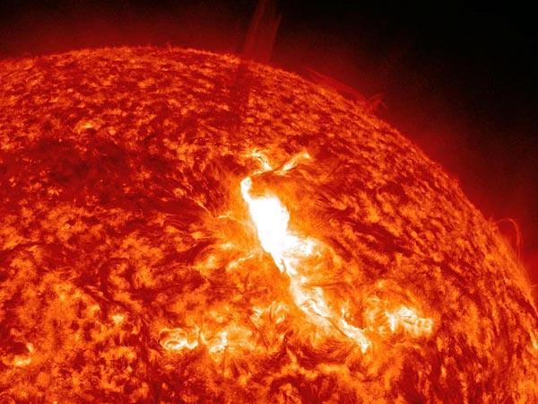 Solar Storms Large eruptions from Sun s surface are called flares or storms Will increase flow of charged particles to Earth, increase