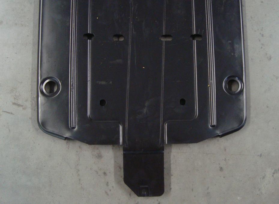 (See Illustration 1-3). 3. Drill holes through the skid plate at locations marked.
