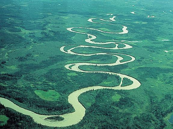 MEANDERING STREAM - The meandering stream wanders laterally across a channel, often on a gentle slope.