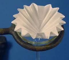 Increasing surface area of filter paper in contact with mixture being filtered.