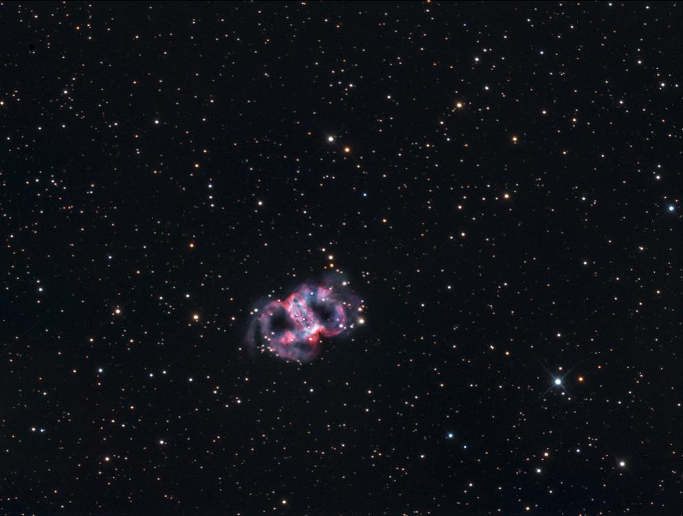 M76 (Little Dumbbell Nebula) M76: "The Little Dumbell". This complex bubble of gas is the cloud of material ejected by a dying star.