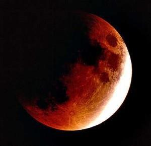 PARTIAL LUNAR ECLIPSES For most lunar eclipses, Earth, the moon, and the sun are not quite in a line, and only a