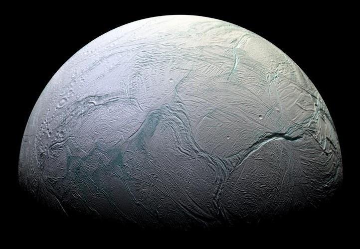 of Saturn's moons. The two sides of Iapetus, Saturn s yin yang moon. Credit: NASA/JPL Saturn s moon of Enceladus.
