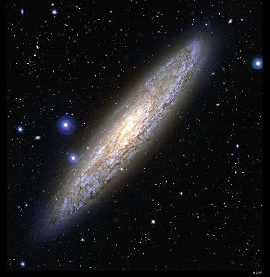 Spiral Galaxy NGC 253, almost sideways. About 10 million light years away.