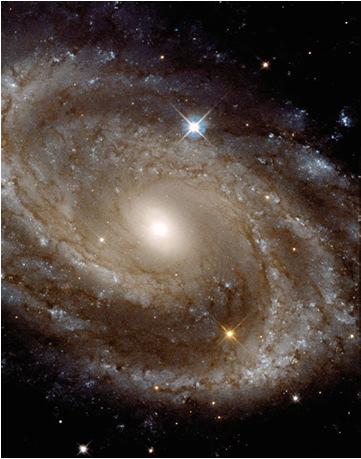 31 Spiral arms are regions of higher density gas and dust, called spiral density waves. The compression of this gas triggers the formation of new stars.