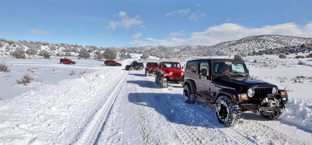At one point the group attempted to take a trail north toward Newcastle Reservoir. Below, some vehicles return to the road after testing the snow depth and difficulty of continuing.