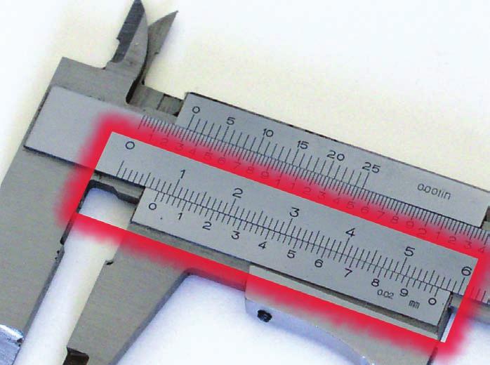 But look closer: The zero line on the vernier is just a tiny bit shy of the half-inch mark. That indicates that this feeler gauge is less than half an inch but how much less?