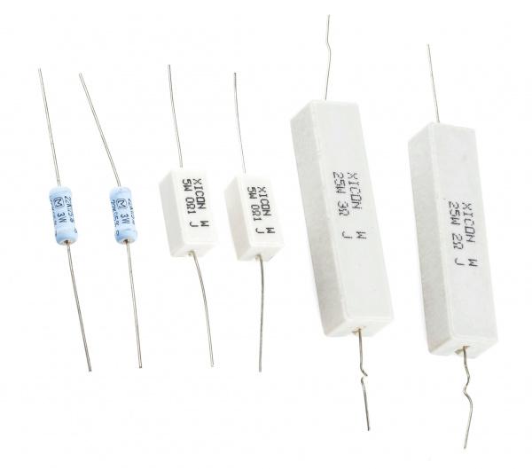 These large resistors are built to dissipate lots of power. From left to right: two 3W 22kΩ resistors, two 5W 0.1Ω resistors, and 25W 3Ω and 2Ω resistors.