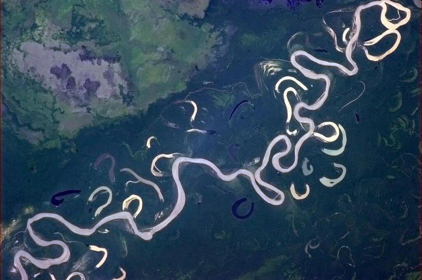 Meandering Channel Erosion - II Cutoff - formed when the river cuts through a narrow neck of a loop in a meander Oxbow lake - a horseshoe shaped body of water that forms when a wide meander from the