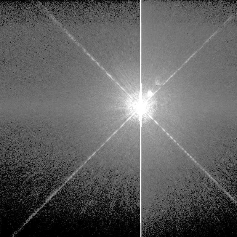 Fig. 7. Entire WFPC2 PC eld of a bright star imaged in F502N. The two ghosts to the lower right of the star are caused by multiple internal reections within the lter.