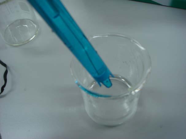 -Rinse the electrode with distilled water and place it in the sample to be