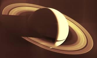 Titan! Largest satellite of Saturn! Radius 40% of Earth s radius!