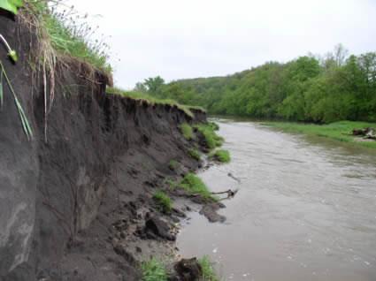 River erosion is... the wearing away of rock and soil found along the river bed and banks.