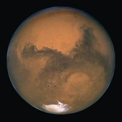 Page 236 9.3 Mars Mars is named for the Roman god of war, presumably because of its distinctly reddish color. Compared with Mercury and Venus, Mars seems positively Earth like.