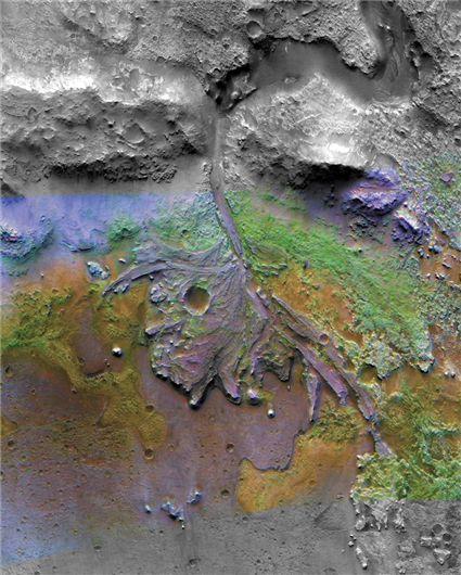 Figure 9.30 Mars Reconnaissance Orbiter image of fanning outflow in a former crater lake.