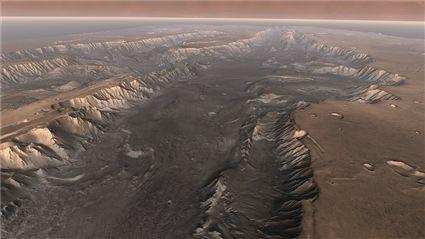 Figure 9.18 A reconstructed view down Valles Marineris, the Grand Canyon of Mars.