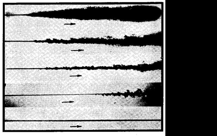 Figure 1.11: Photographs detailing the effect of ambient pressure on fuel jet breakup, modified from Lee and Spencer [48].