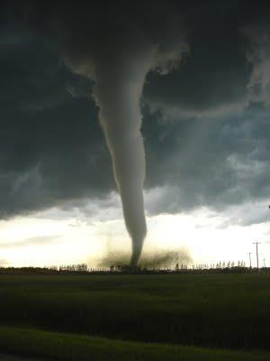 Task 1: Tornadoes What is a tornado? A tornado is a violent spinning column of air extending from a thunderstorm to the ground.