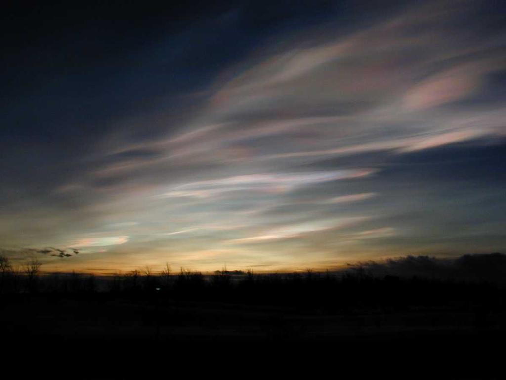 Particles and clouds also impact atmospheric composition (DJ Pages 178-186) This is a picture of polar stratospheric clouds from Kiruna, Sweden, taken from a parking lot at the airport where I was