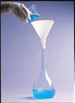 higher volume and lower molarity for use Note that a 1 M solution is not made by adding 1 mol of solute