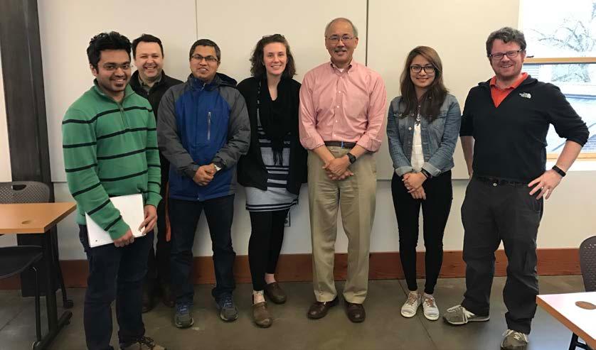 Below is a photograph of the officers with faculty advisors, a graduate student and a guest speaker. *From left to right: Madhav Parikh, Dr.