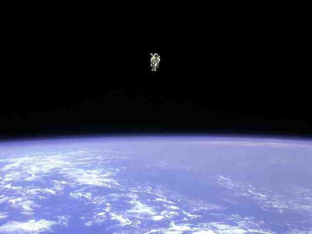 An Astronaut in Orbit 49 Satellite Motion! A satellite that is orbiting the Earth is able to stay in orbit for many years (forever, in principle)!