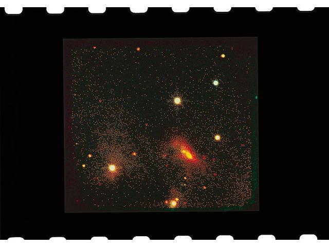 Still enshrouded in opaque cocoons of dust => barely visible to normal telescopes, but bright in the
