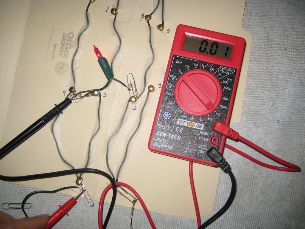 measuring current Electric current is measured in amps (A) using an