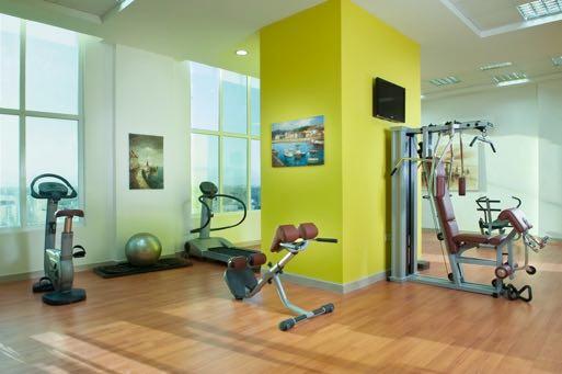 the swimming pool and pool bar restaurant. The gym offers high-end fitness and wellness equipment from Techno gym for guest comfort.