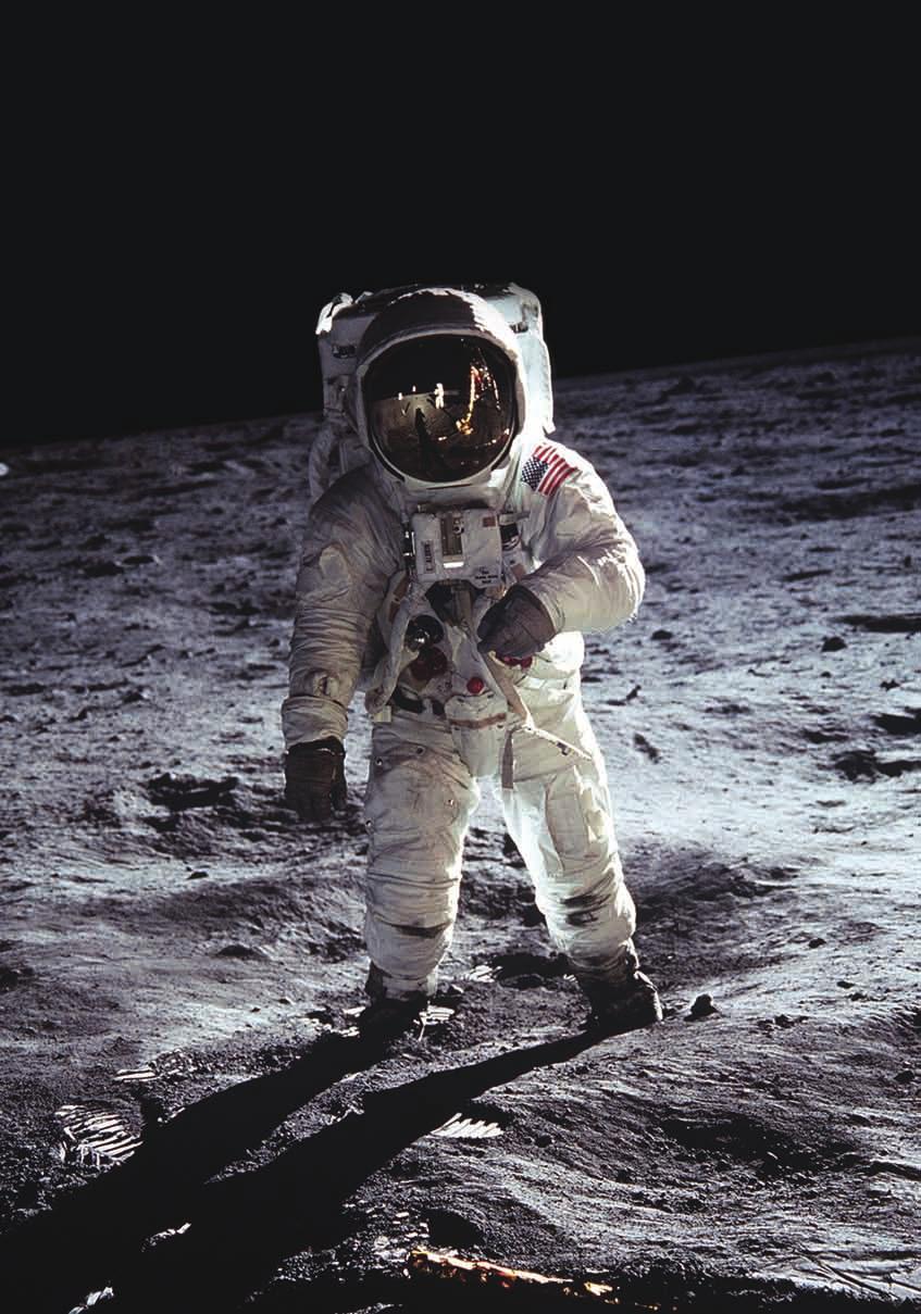 At last astronauts landed on the Moon and began to