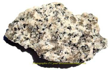 Texture of Igneous Rocks Depends on of