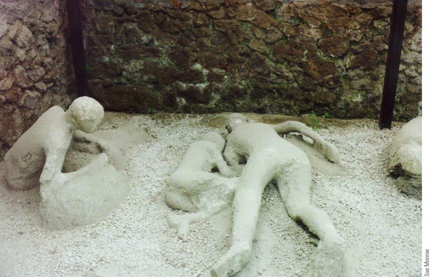 ! Body casts of some of the volcano s victims in Pompeii.