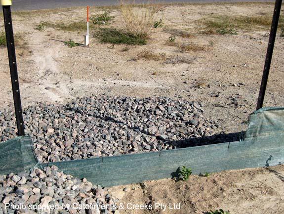 (d) Fabric-based spill-through weirs: Fabric spill-through weirs are most commonly formed from woven sediment fence fabric; however, these outlet structures can also be formed from non-woven fabrics