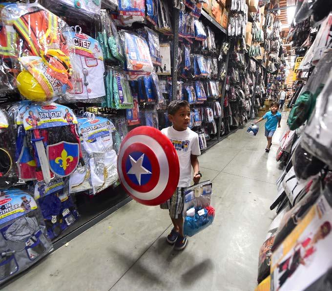 Modern-day druids perform a blessing at Stonehenge in southern England. The Celts: Samhain A boy shops for his Captain America costume at a costume store in Montebello, California.