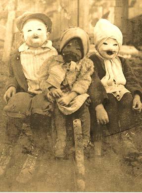 Children bob for apples at a party in the United States in the early 1900s. Traditions of the Past Some older Halloween traditions are less well known today.