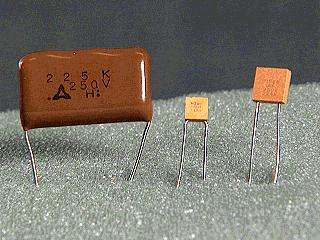 A dry electrolytic capacitor consists essentially of two metal plates separated by the electrolyte.
