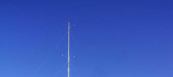 SECTION 2 - Instrumentation and Equipment An unpainted, 40 m NRG tower holds five NRG anemometers on three booms: one at 10 m,