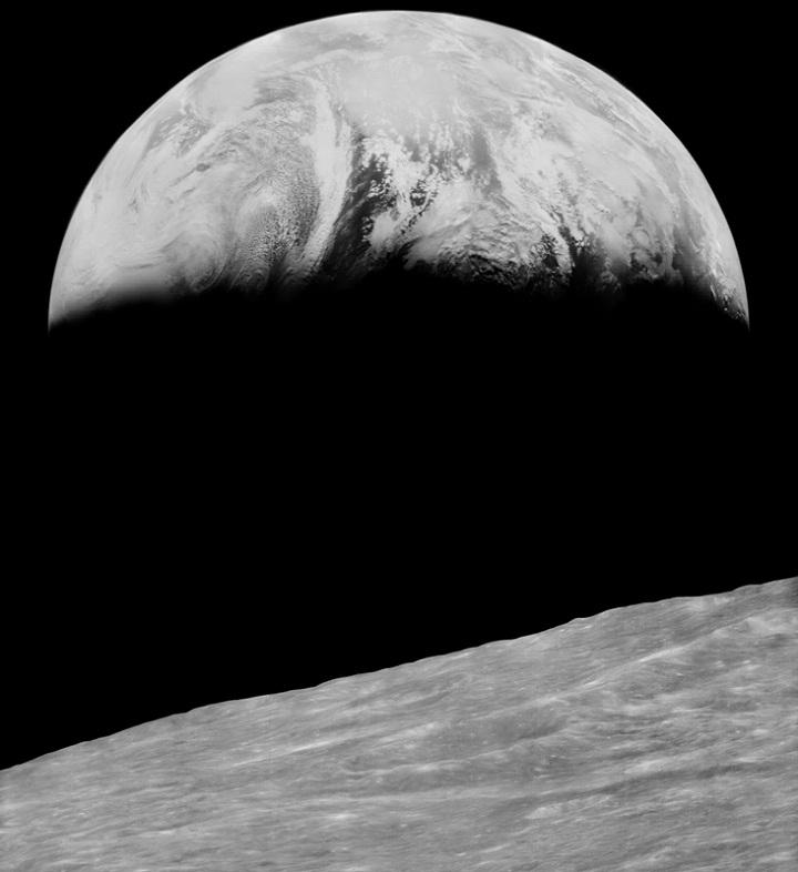 NASA's Lunar Orbiter 1 took the first photograph of Earth as seen from the vicinity of the moon in 1966.