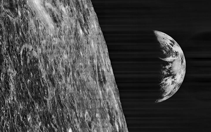 " -- David Kring In the below high-resolution frame, we see the Earth above the limb of the moon in