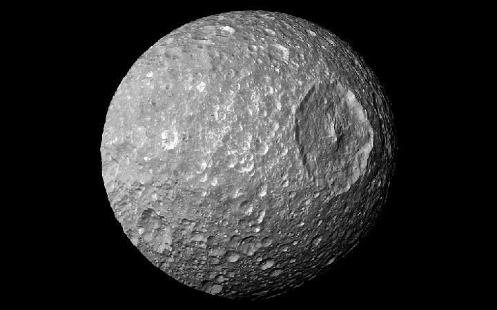 Herschel Crater in this view (captured by NASA's Cassini spacecraft on 13 February 2010) dominates Mimas, making the moon look like the Death Star in the movie "Star Wars.